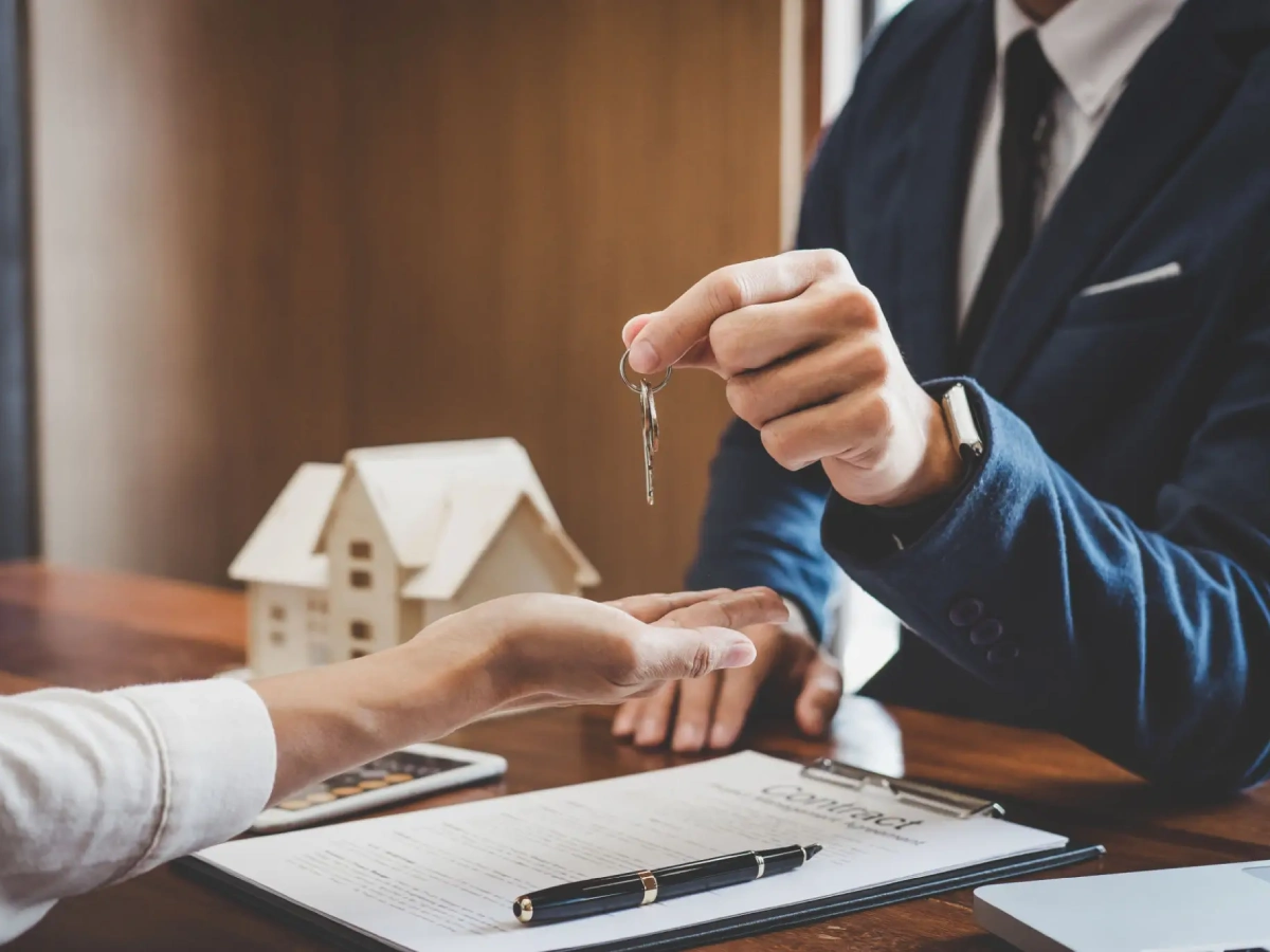 Property transaction with keys and documents