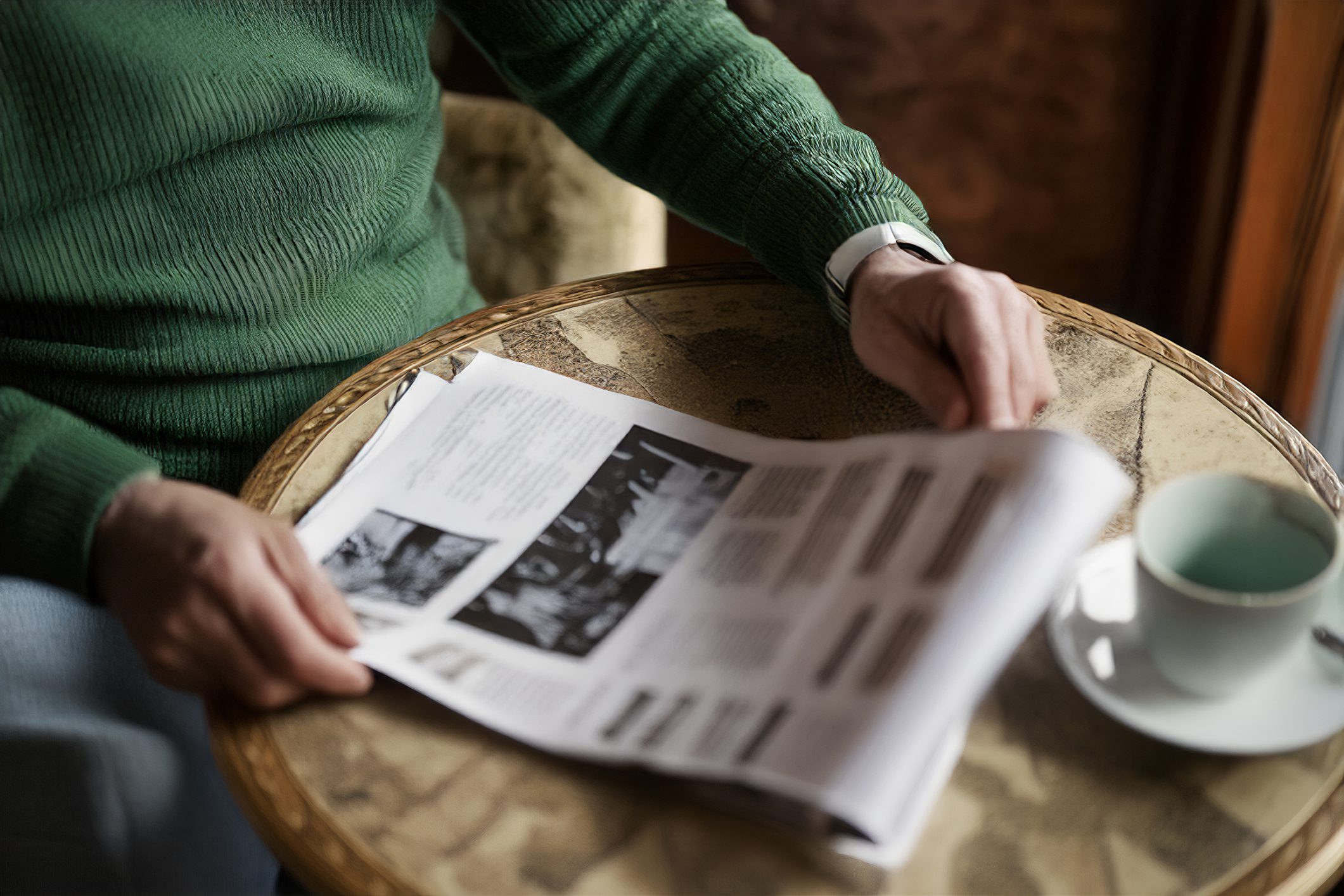 Morning news and coffee at a table