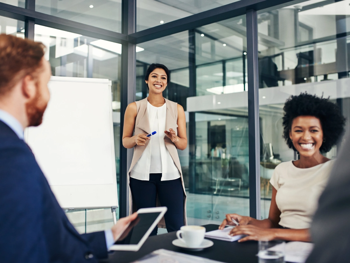 Business meeting with smiling professionals